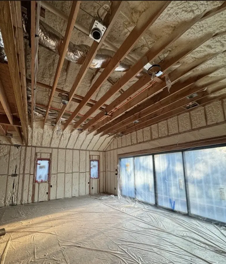 Interior walls and ceiling insulated with spray foam during new construction in Crofton